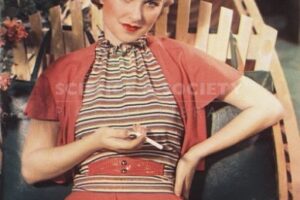 Woman holding-a-Lucky-Strike-cigarette-1939 for Vogu